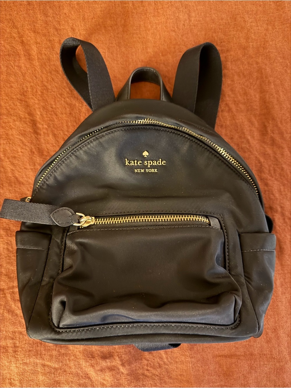 kate spade black mini backpack with gold hardware